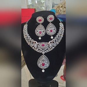 Gold plated diamond cut v necklace set with high quality ruby AD stone